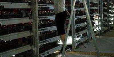 Expansive Cryptocurrency Mining Farm with Rows of ASIC Machines